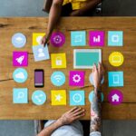 group-of-computer-icon-on-the-wooden-table-P77YUSB